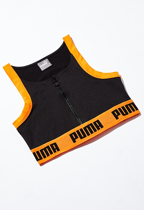 Sujetador con cremallera en negro y naranja exclusivo en ASOS de Puma