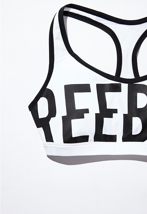 Sujetador de sujeción media con logo de Reebok