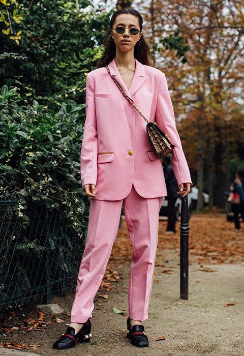 Blogger wearing a pink suit