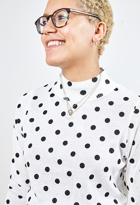 ASOS staff wearing a polka dot jumper