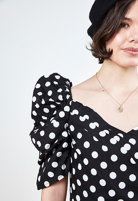 ASOS staff wearing a puff sleeve top