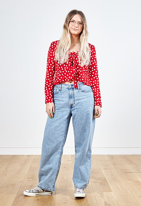 ASOS staff wearing a red polka dot top