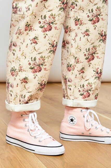 Lottie Selby wearing floral dungarees available at ASOS