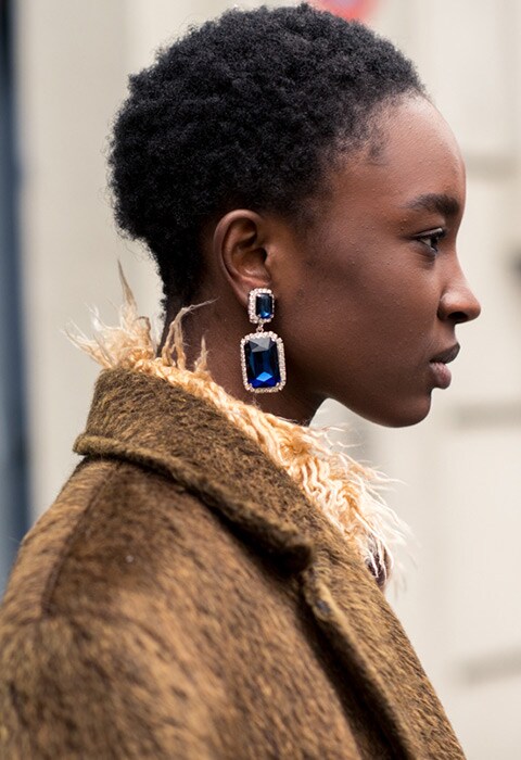 Model wearing diamante drop earrings at Milan Fashion Week AW18