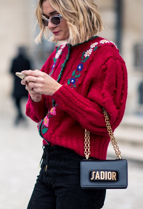 Blogger wearing a crochet knit at Paris Fashion Week