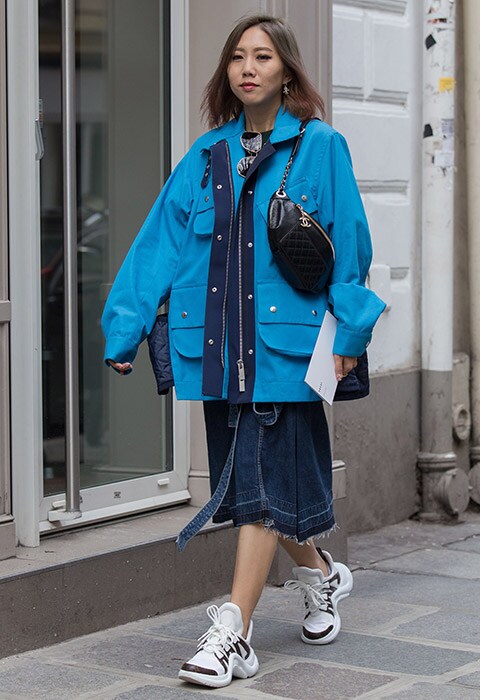 Faye Tsui in Louis Vuitton sneakers at Paris Fashion Week