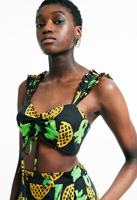 Model wearing MADE IN KENYA SS18 asymmetric dress