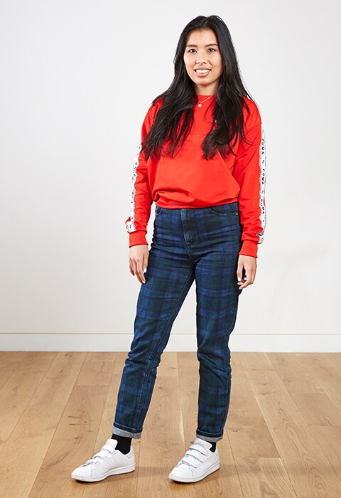 ASOS staff wearing a red knit  jumper for spring style