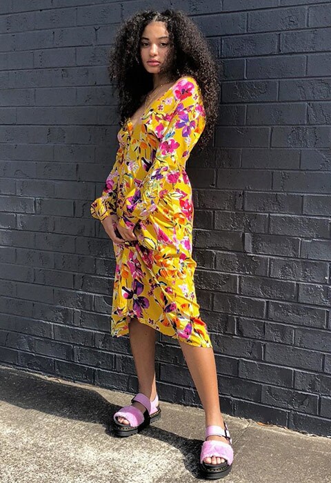 ASOS Insider Ebony wearing a vintage-style floral print spring dress