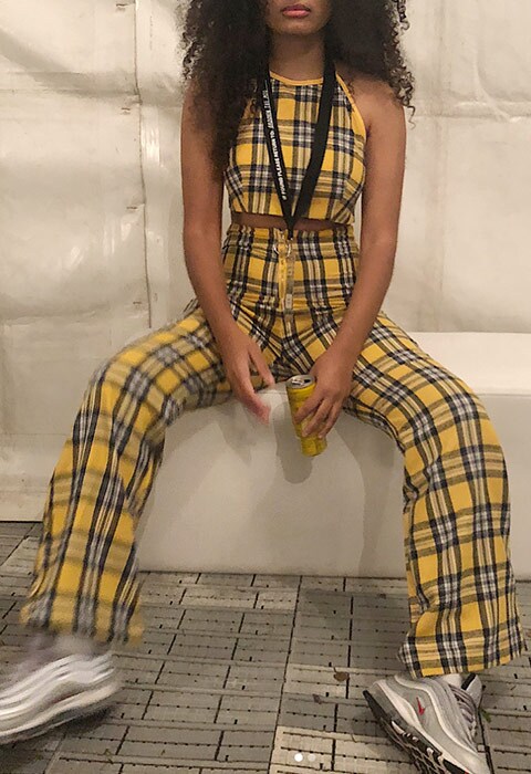 ASOS Insider Ebony wears a check twi piece for spring