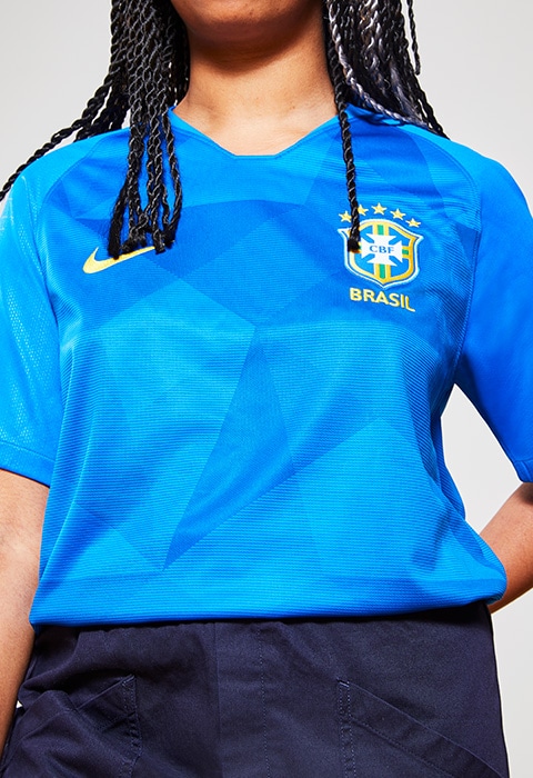 Lakeisha Goedluck wearing a Portugal football shirt, available at ASOS