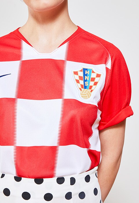 Bella Gladman wearing a Croatia football shirt, available at ASOS