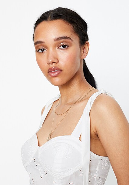 Model wearing spring corset top, available at ASOS