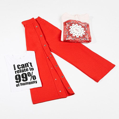 Popper pants, a slogan top and hoodie from Cheap Monday