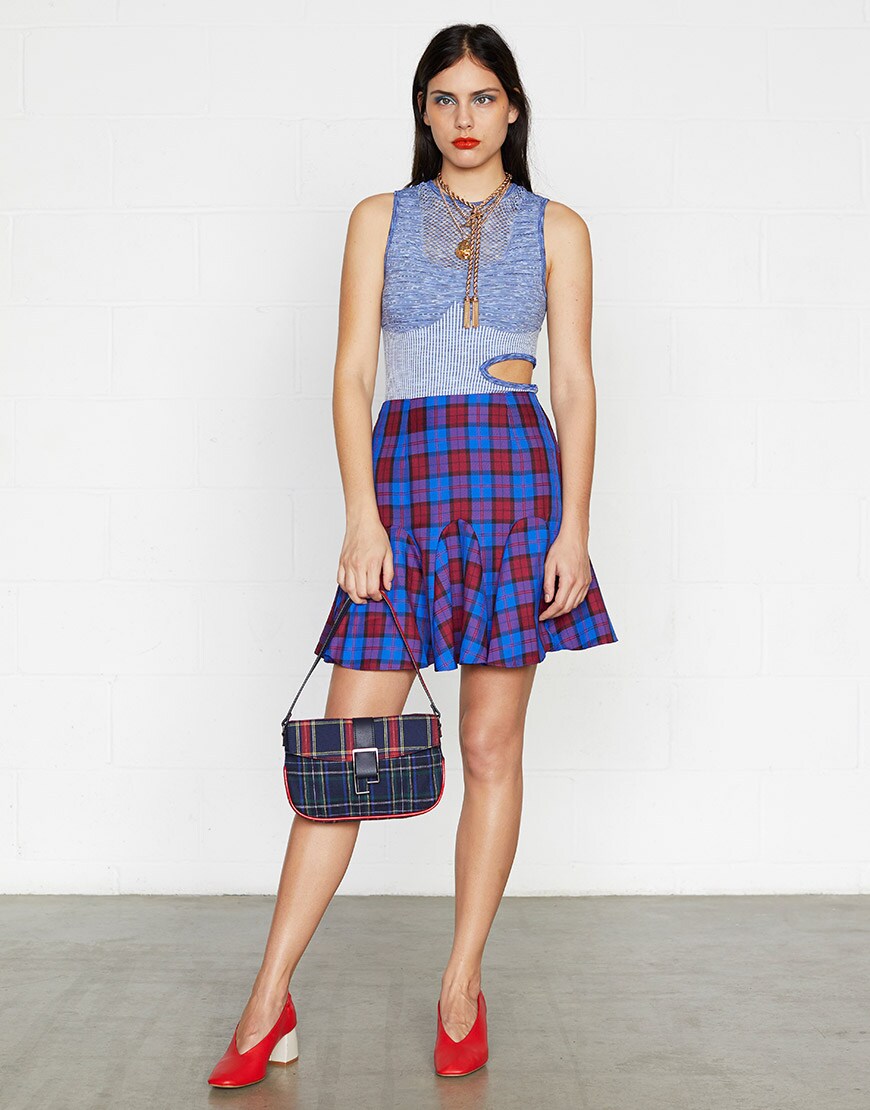 ASOS model wearing a check skirt, top and red heels | ASOS Style Feed