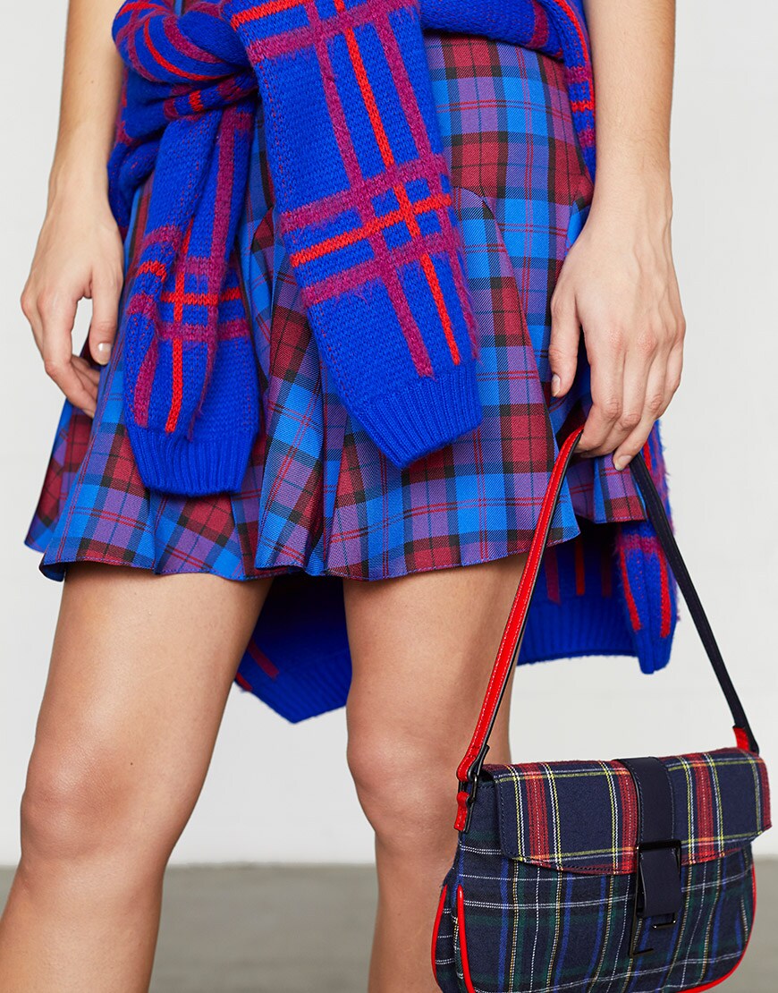 ASOS model wearing a check sweater, skirt and red heels | ASOS Style Feed