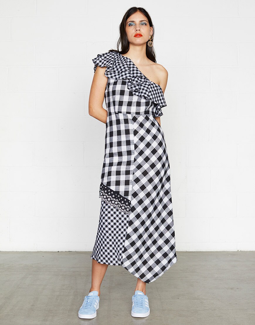 ASOS model wearing a black and white gingham top and skirt with blue trainers | ASOS Style Feed
