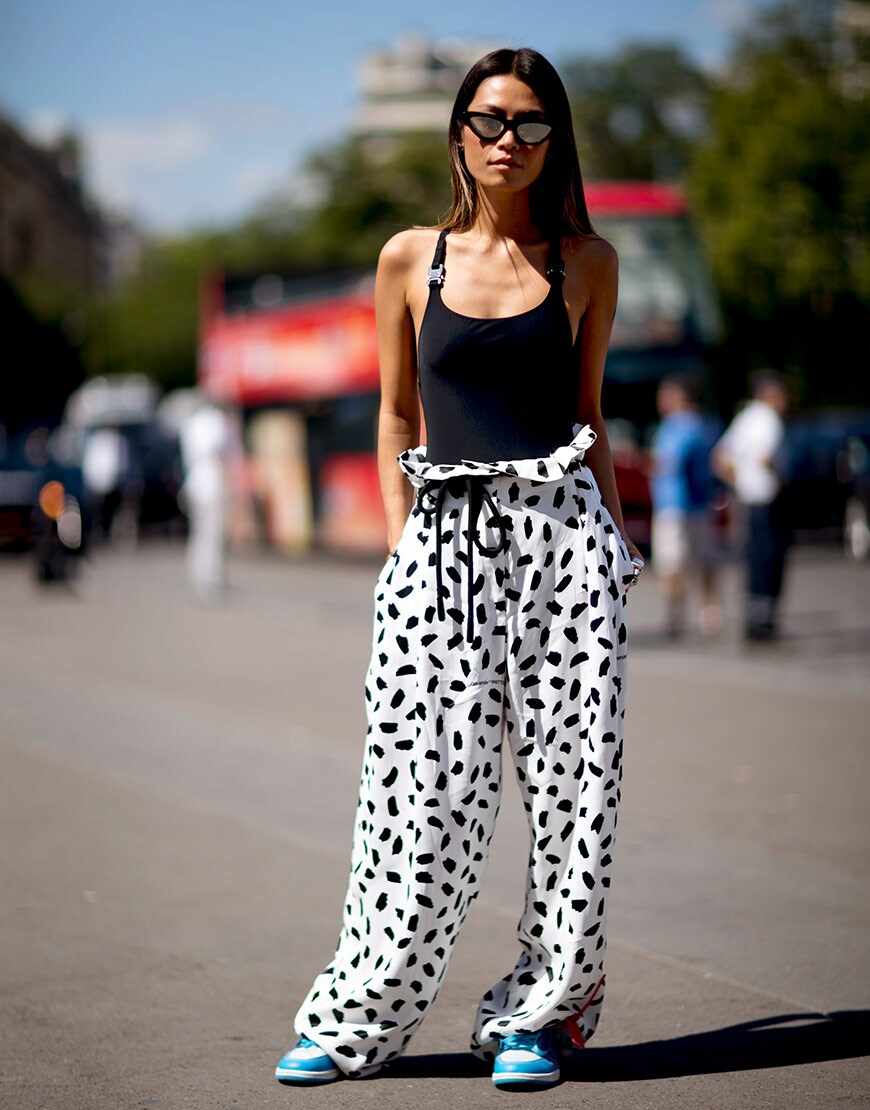 Street styler in monochrome trousers and vest