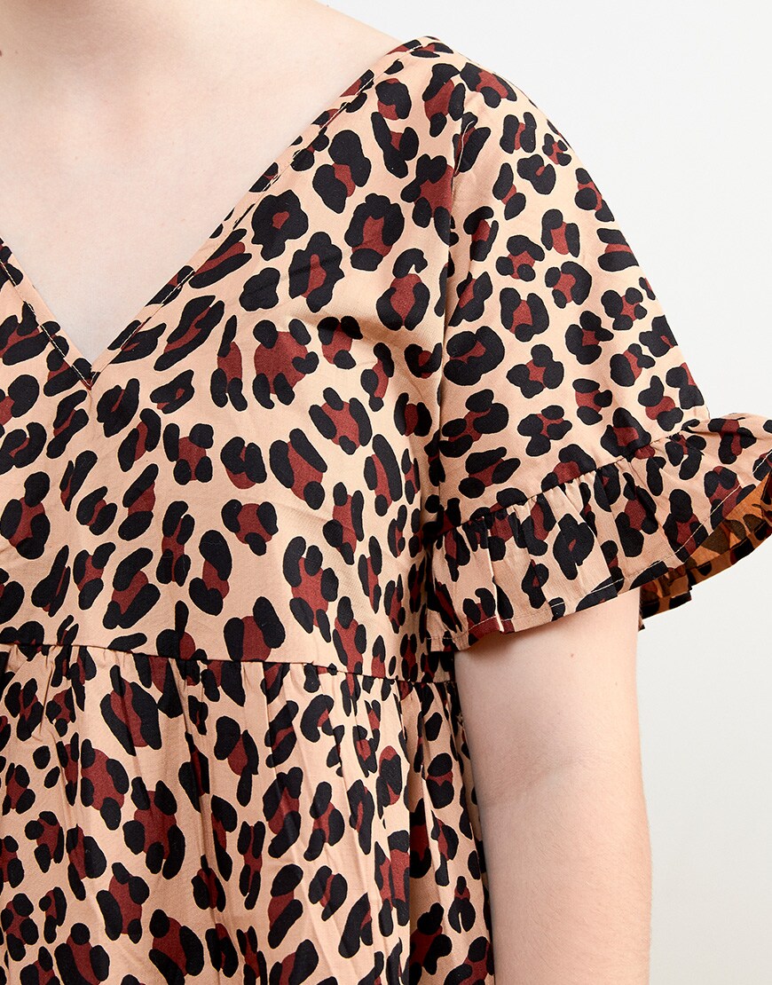 ASOS staff member wears leopard dress | ASOS Fashion & Beauty Feed