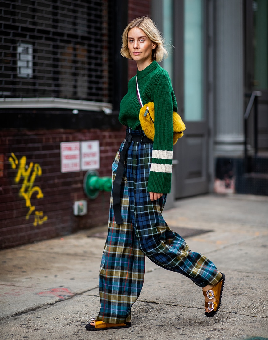 Lisa Hahnbueck wearing plaid pants at New York Fashion Week