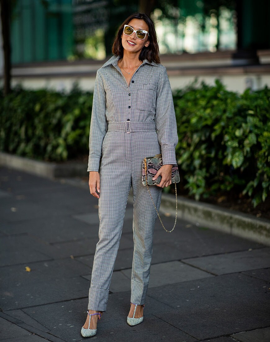 Street styler in checked boiler suit at London Fashion Week | ASOS Style Feed