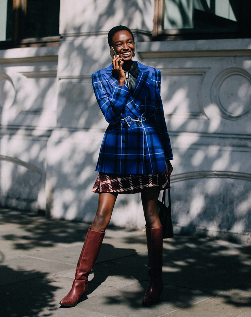 Street styler wearing tartan at London Fashion Week | ASOS Style Feed