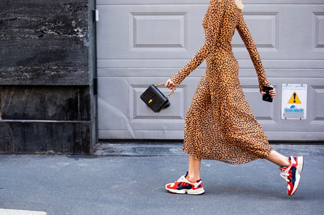 Milan Fashion Week accessory trends ASOS leopard print dress sneakers and chain handle bag