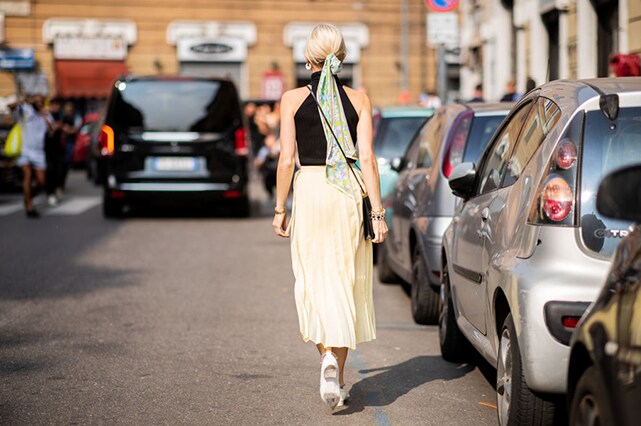 Caroline Daur wearing hair scarf at Milan Fashion Week