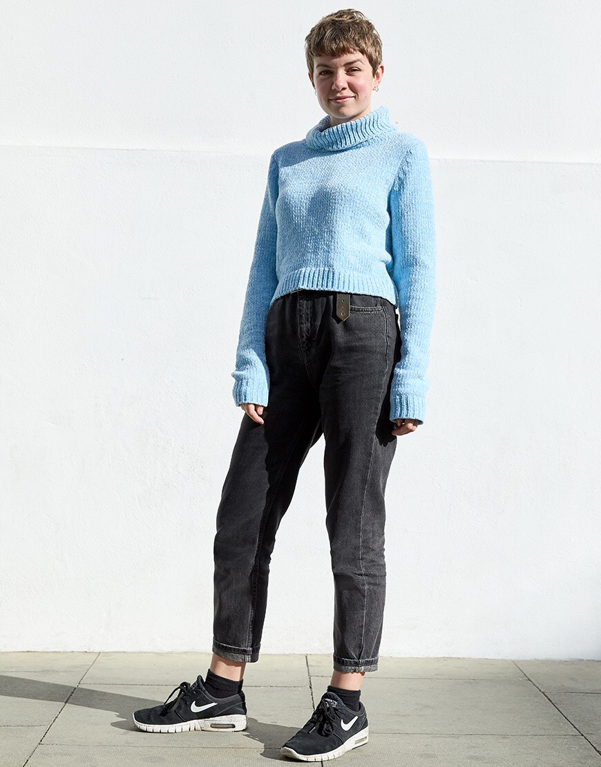 ASOSer wearing a light blue roll-neck, black mom jeans and Nike trainers | ASOS Style Feed