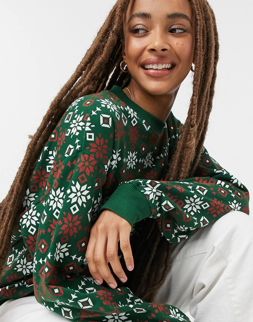 Model wearing Monki Nana organic cotton Christmas fairisle print sweater in green