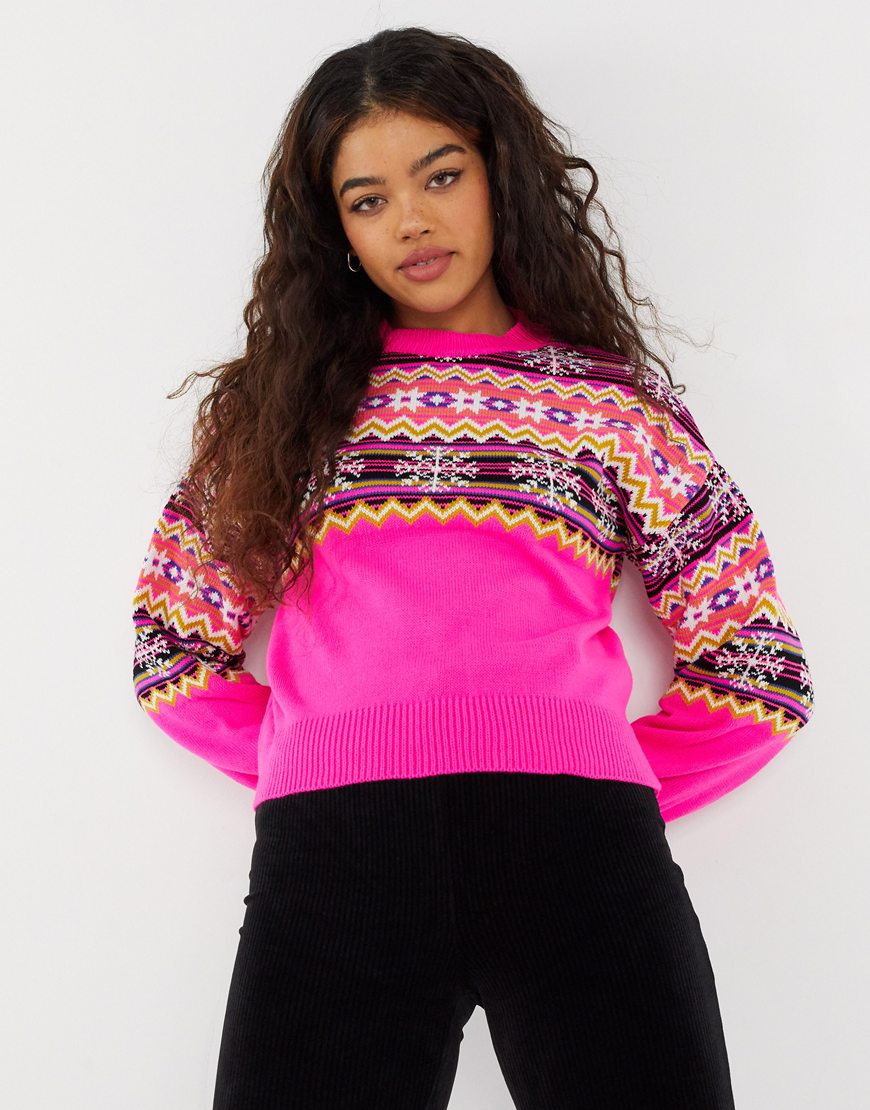 Model wearing ASOS DESIGN Fair Isle jumper in bright pink