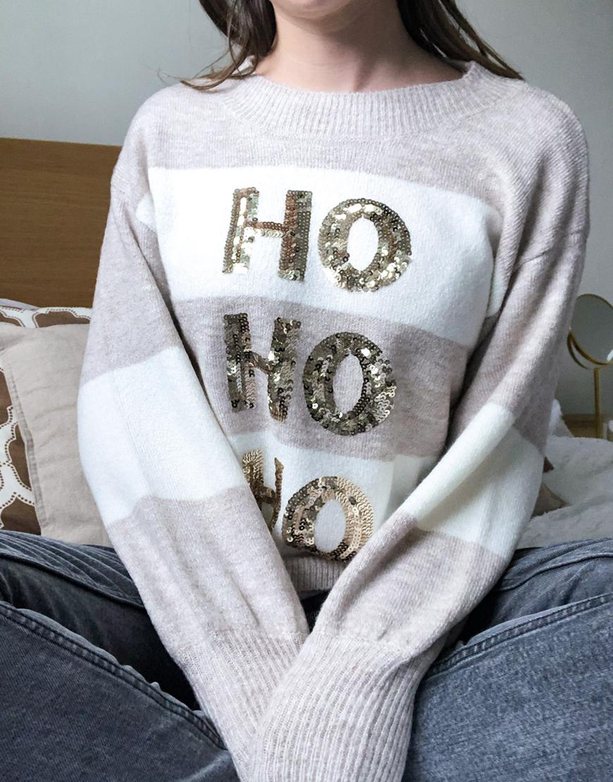 Model wearing Ho Ho Ho Christmas jumper