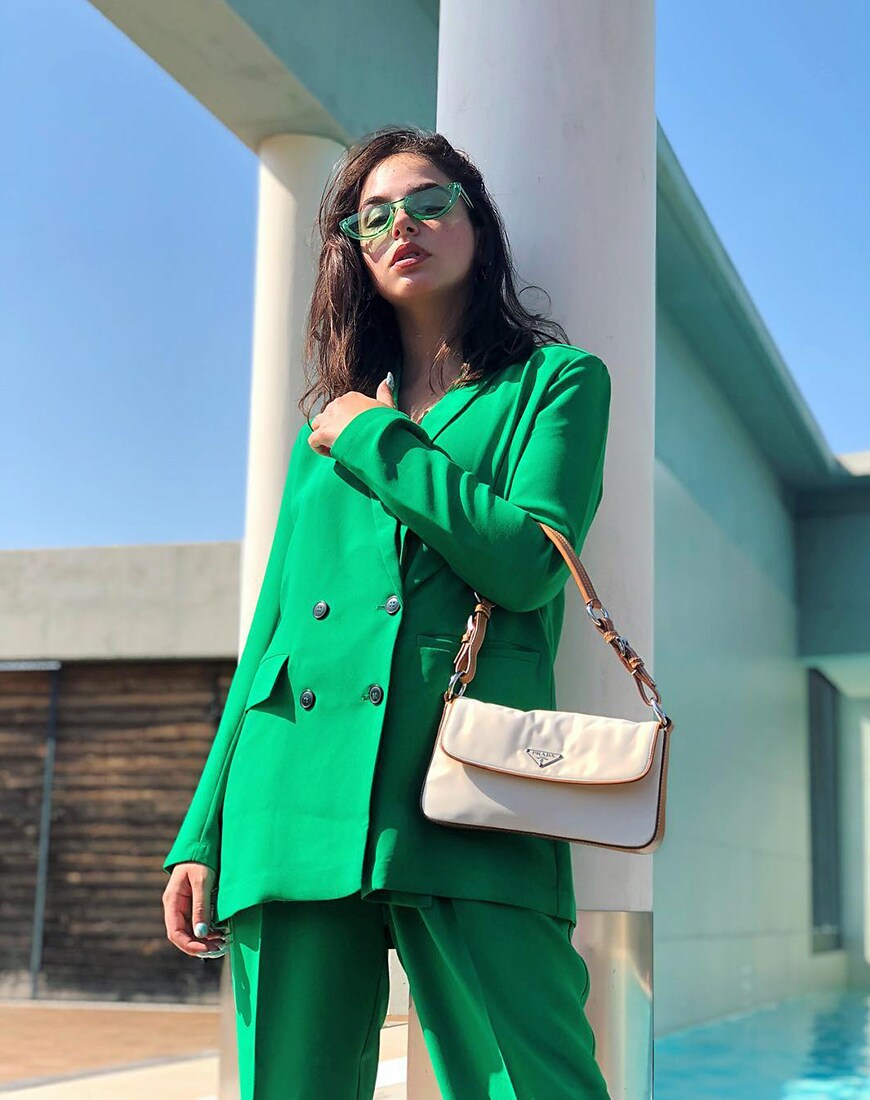 ASOS Insider Barbara wears a green suit | ASOS Style Feed