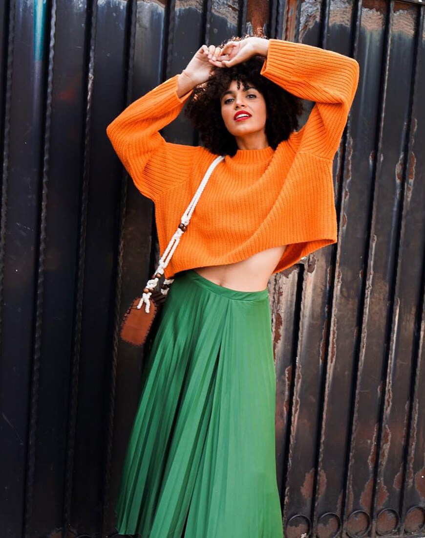 ASOS Insider Syana in an orange knit and a midi skirt | ASOS Style Feed