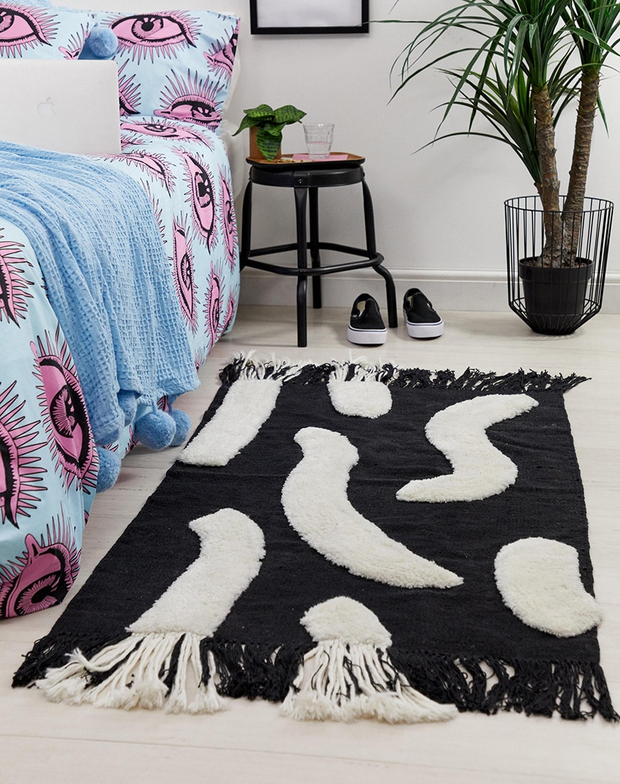 A picture of a black and white rug by ASOS SUPPLY. Available at ASOS.
