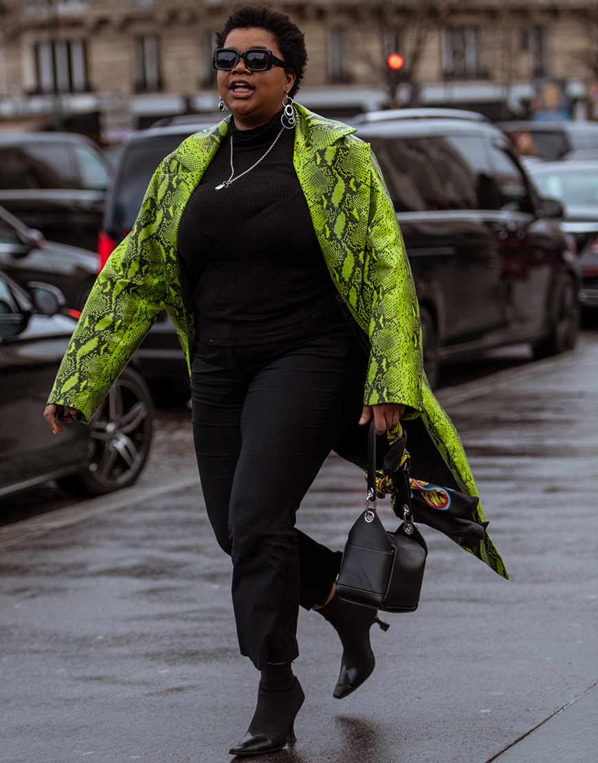 Street style picture of a woman in a neon snake skin coat | ASOS Style Feed