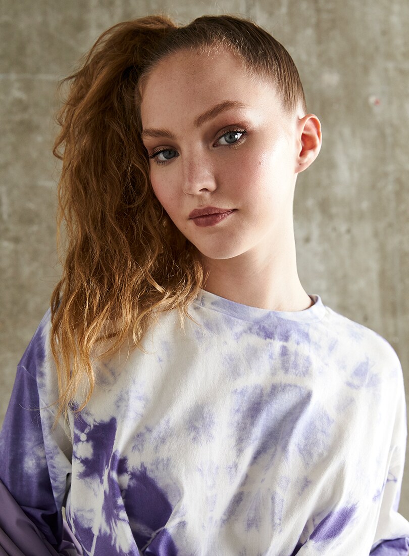 A model wears a tie-dye t shirt and blazer | ASOS Style Feed