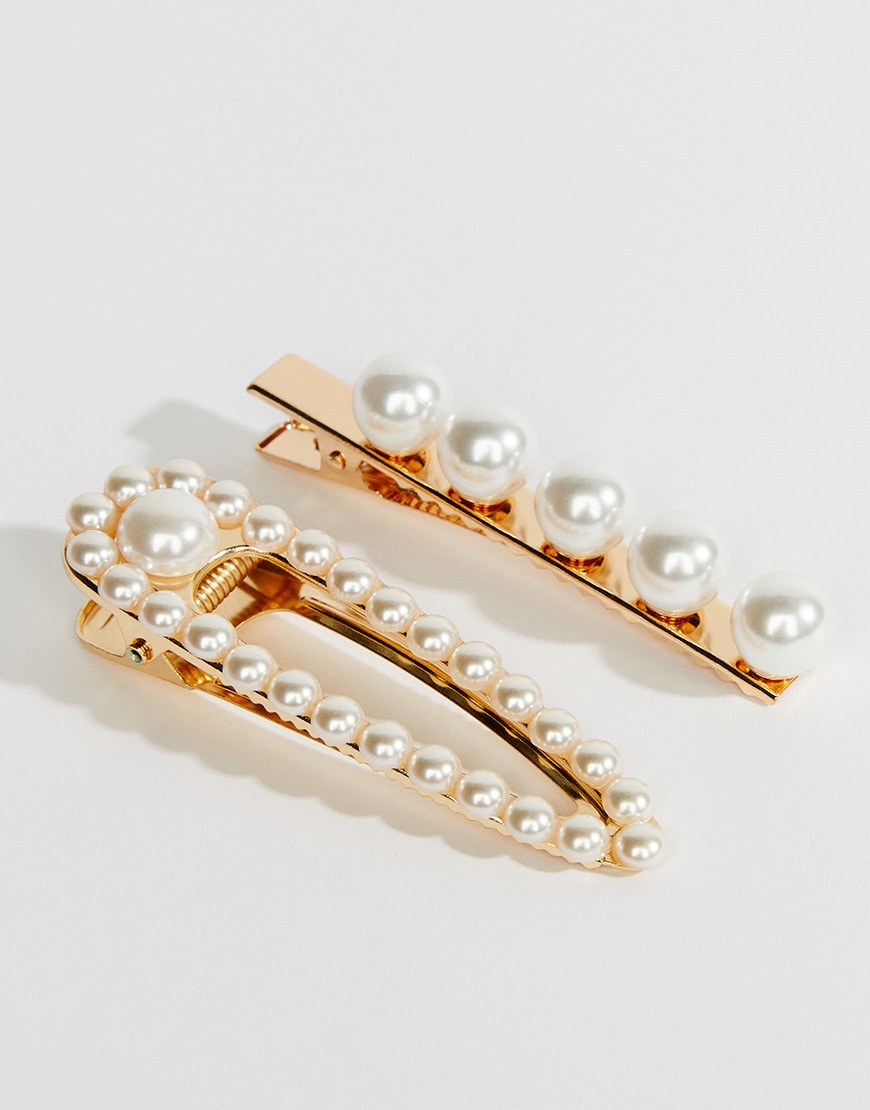 A picture of two faux-pearl embellished hair clips. Available at ASOS.