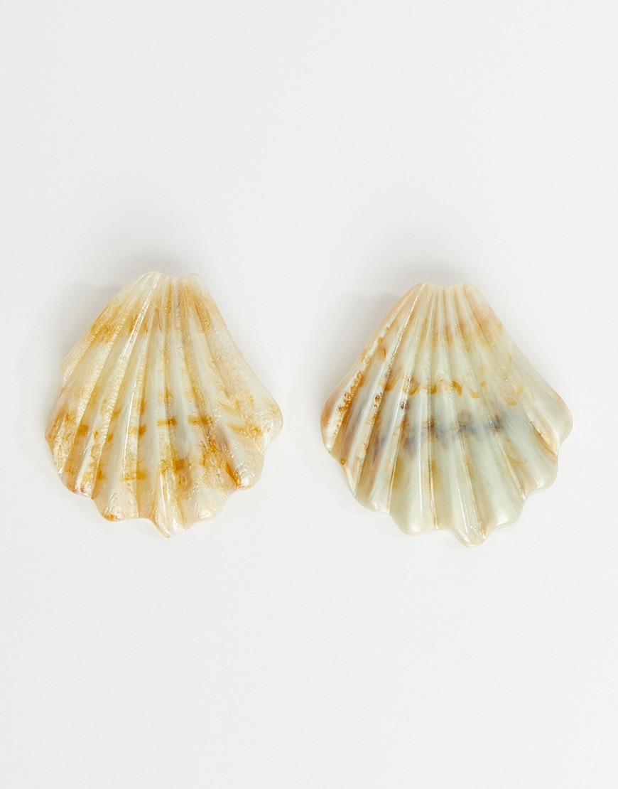 A picture of two shell earrings. Available at ASOS.