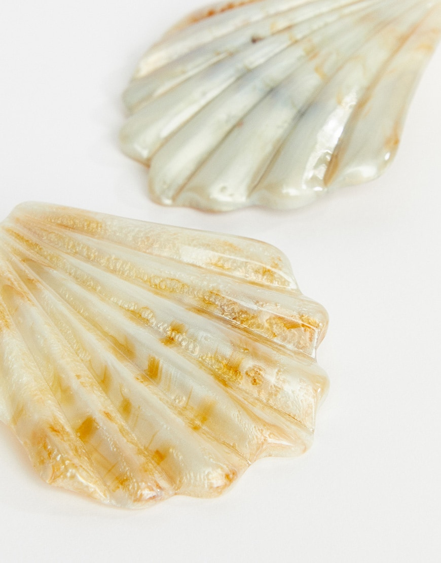 A picture of two shell earrings. Available at ASOS.