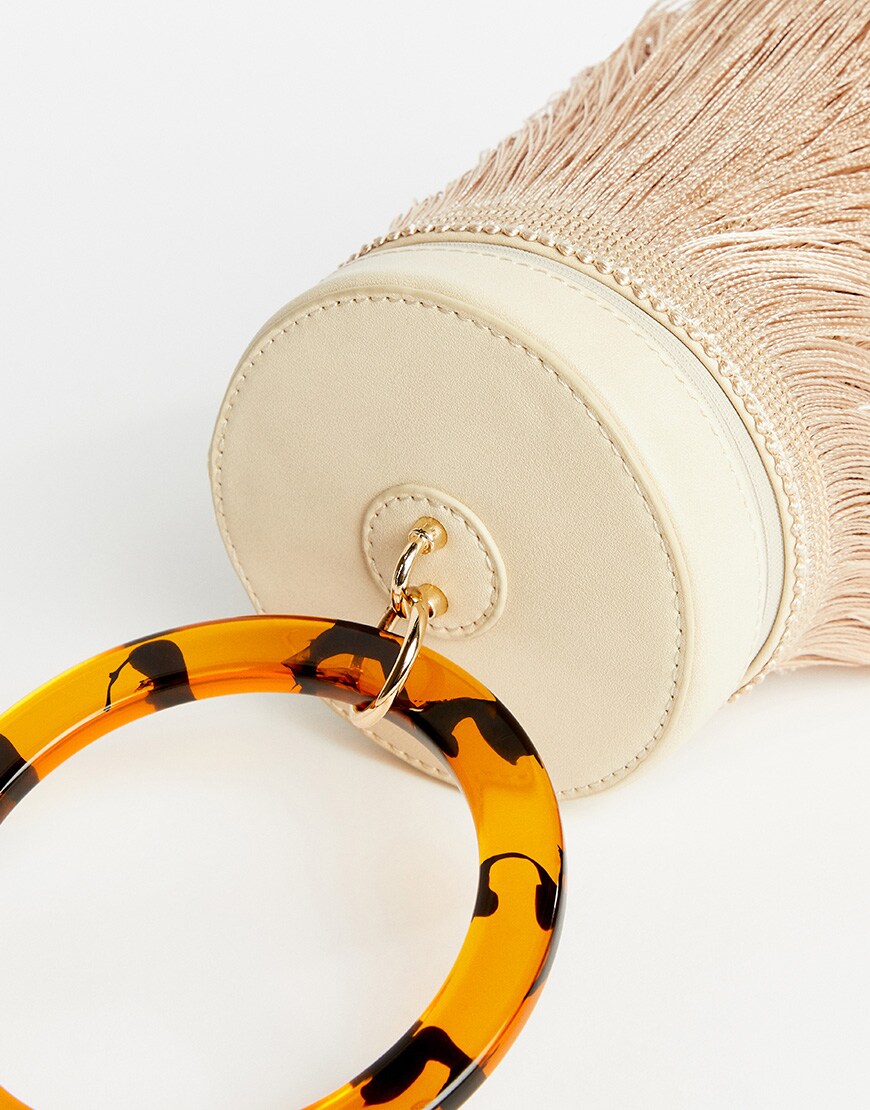 A picture of a statement tassel bag. Available at ASOS.
