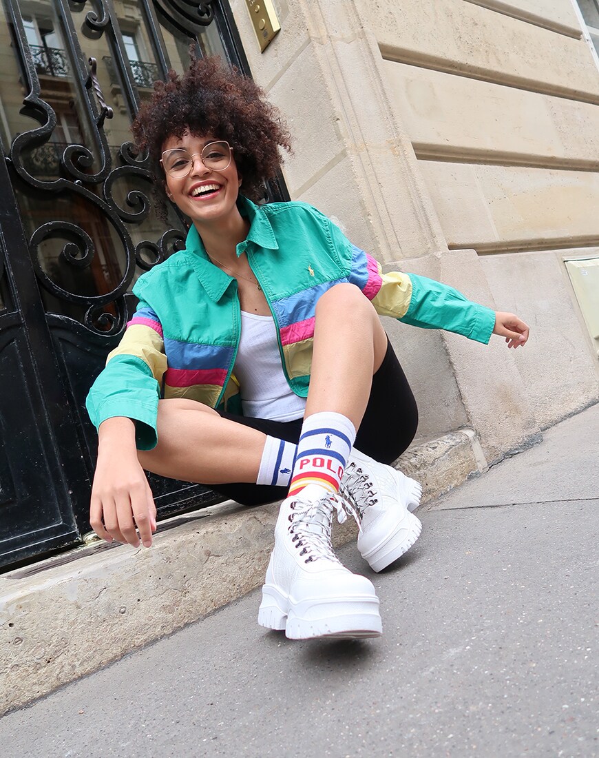 ASOS Syana porte un bomber et des chaussettes Polo Ralph Lauren