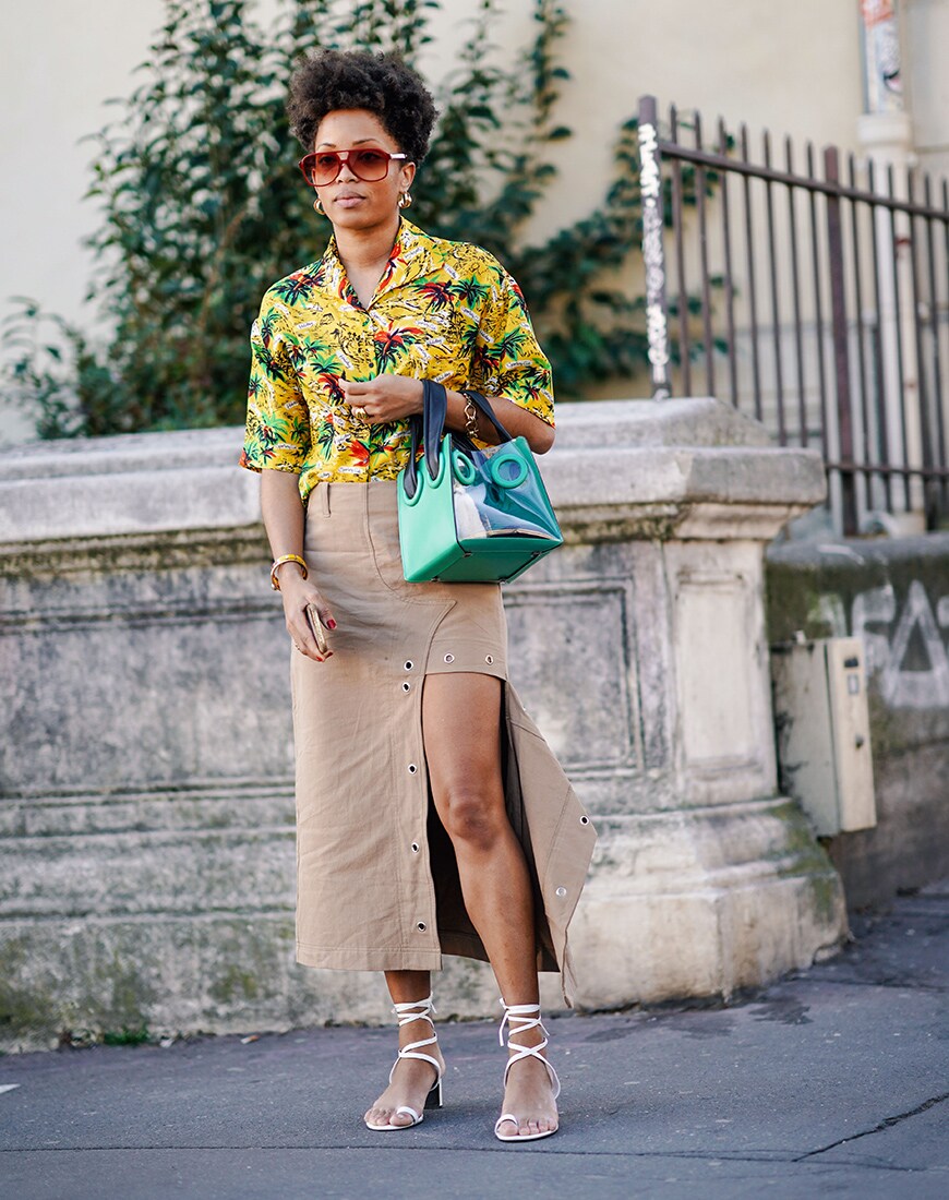 A street style image of a woman in a utility skirt | ASOS Style Feed