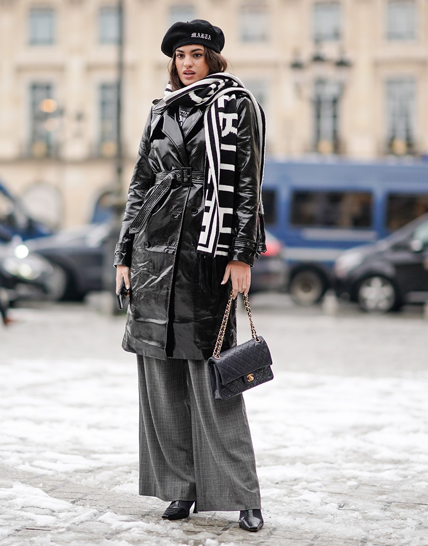 A street style image of a woman in a PVC coat | ASOS Style Feed