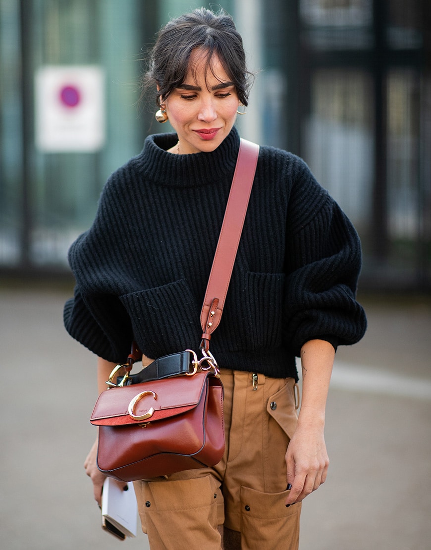 A street style image of a woman in a ribbed sweater | ASOS Style Feed
