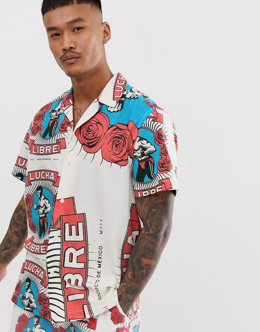 A picture of a model wearing a wrestler print shirt. Available at ASOS.