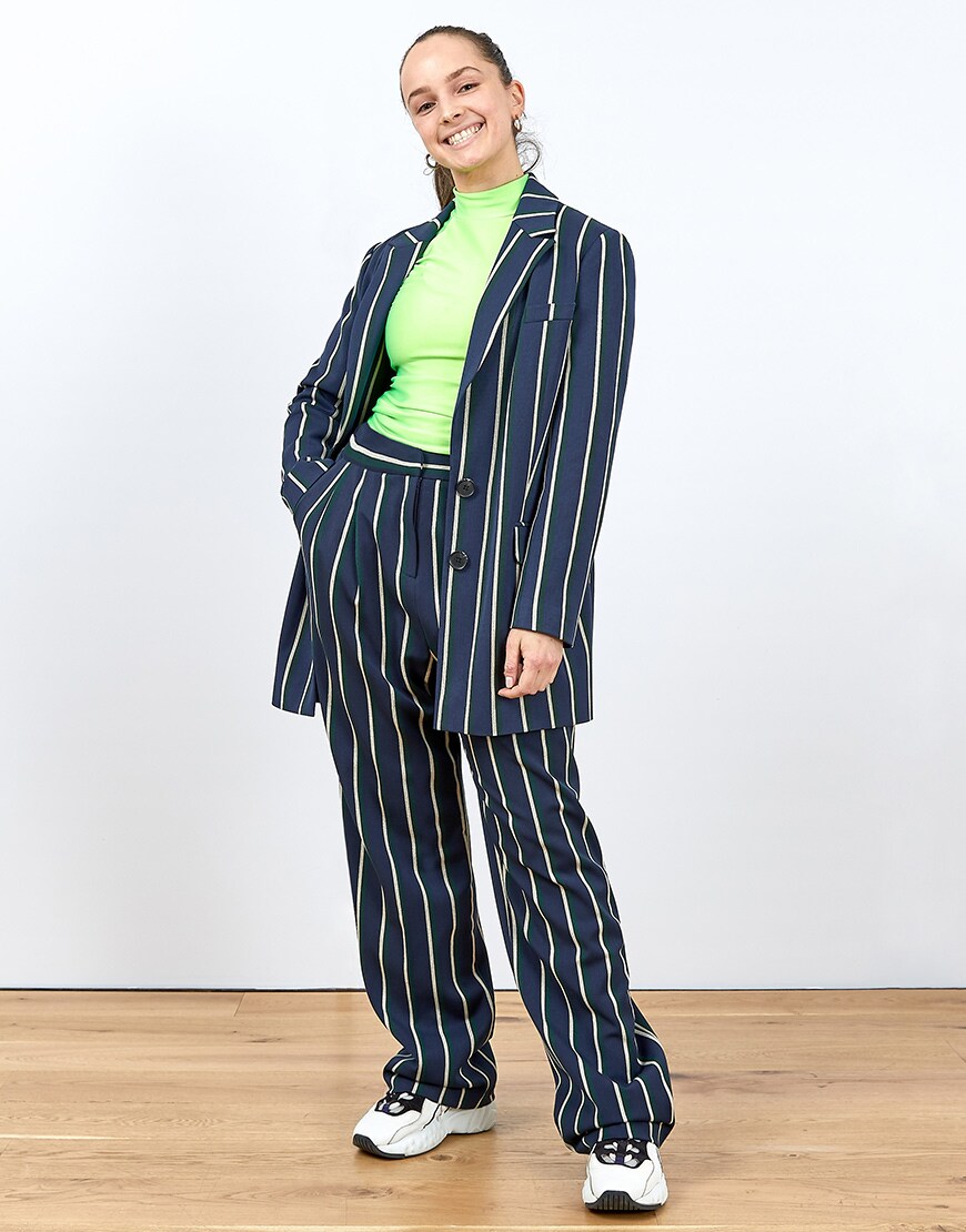 A picture of an ASOSer in a pin stripe suit | ASOS Style Feesd