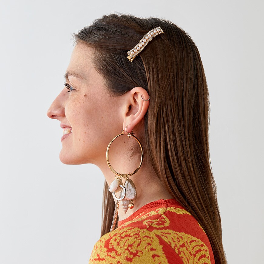 An ASOSer wearing a hair clip and earrings | ASOS Style Feed