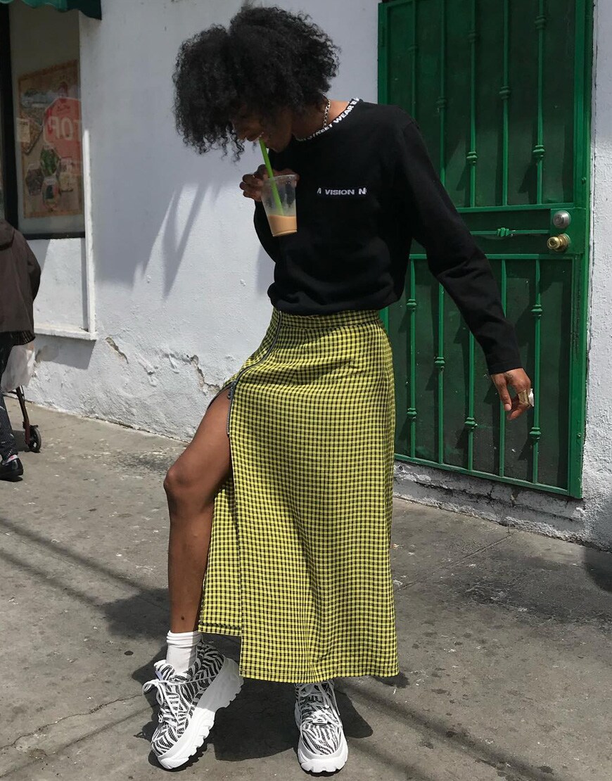 asos ari wearing a midi skirt from the ragged priest and buffalos