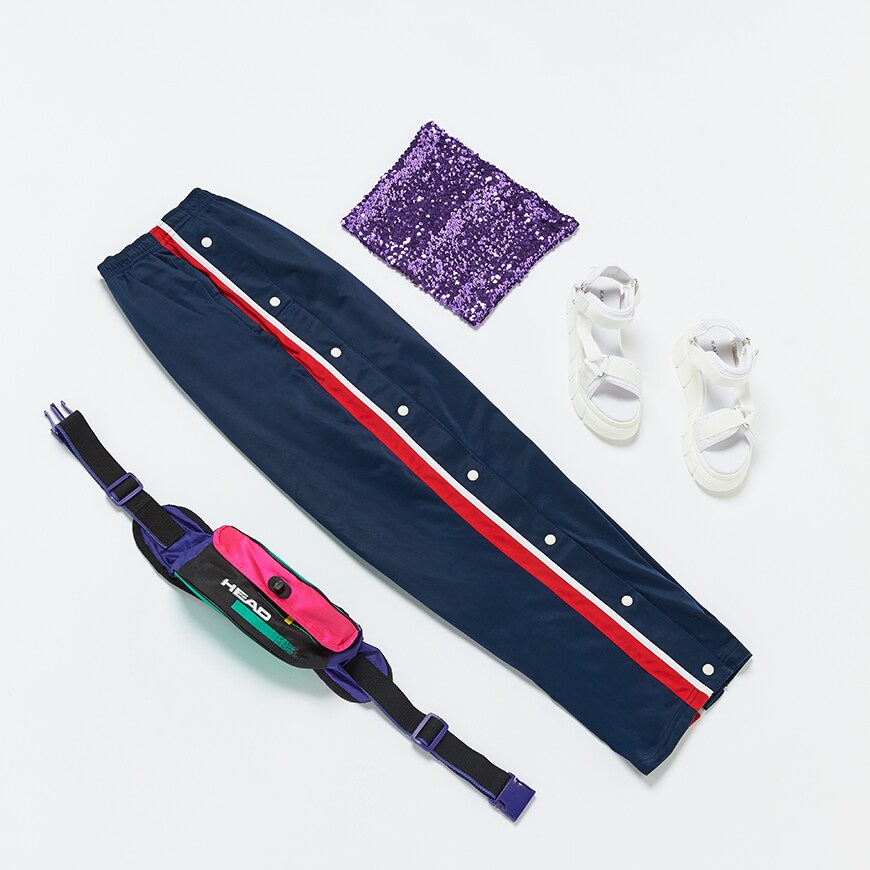 A flat lay of popper pants and a sequin top | ASOS Style Feed